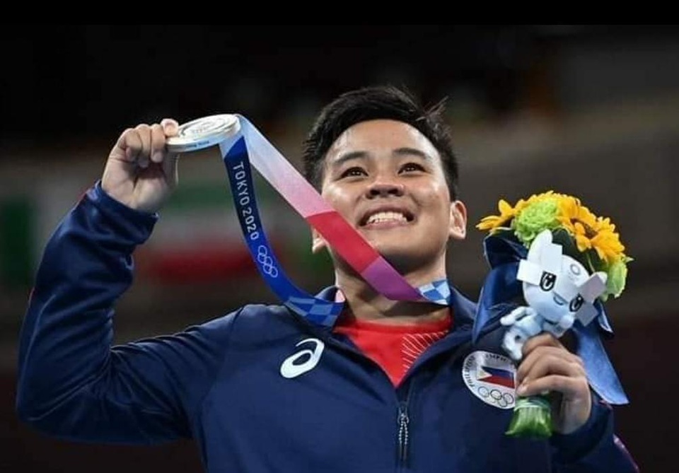 Out boxer Nesthy Petecio of the Philippines is a winner and a proud member of the LGBTQ community. This week, the women's featherweight boxer won a silver Olympic medal and tearfully chose to share the moment with her community, as reported by NBC News. "This win is for the LGBTQ community. Let's go, fight!" she said, according to a translation from ESPN, NBC reports. Petecio is reportedly the first woman from the Philippines to win a boxing medal and the first Filipino boxer to win a medal at the Olympics in nearly 25 years. Petecio's teammate and fellow out boxer Irish Magno became the first Filipino women to compete in boxing at the Olympics, and Magno was the first Filipino woman to qualify for the Games, according to Quartz. "Boxing is one of the most popular sports in the Philippines alongside basketball, The Los Angeles Times reported. Half of the 12 Olympic medals the country has ever won have come in boxing, and it's expected to win two more in boxing before the Tokyo Games end," NBC reports. Petecio says that fellow Filipino boxer Manny Pacquiao has been her greatest inspiration. "I compare my life to his," she said, according to a translation from the Olympic Channel. "We both came from hardships, we both started from nothing. We couldn't eat without debt." She continued, "He really is my idol. Tap link in bio to continue on @EDGEmedianetwork ????️‍? (?️: Emell D. Adolphus / @goodnightdetroit / ?: Nesthy Petecio / Instagram / @neshpetecio / AP)