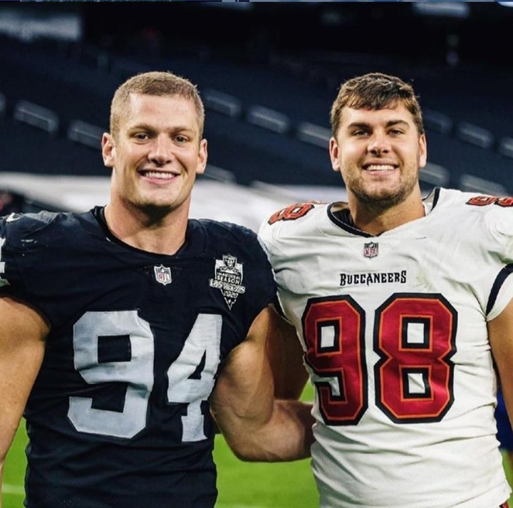 After coming out as gay in an Instagram post, Carl Nassib is officially the LGBTQ sports MVP as sales for his Las Vegas Raiders jersey have since skyrocketed, ESPN reported. "In the 24 hours since Carl Nassib became the first active NFL player to come out as gay, the Las Vegas Raiders defensive end's jersey has been the top-selling item across the league, according to Fanatics," ESPN reports. "Fanatics, the NFL's official e-commerce partner, said Nassib has had the top-selling NFL jersey Monday and Tuesday across the company's network of online stores." During his coming out announcement, Nassib pledged to donate $100,000 to the Trevor Project. In turn, the NFL announced on Tuesday that it will match that donation. In a show of support, President Joe Biden wrote on Twitter: "To Carl Nassib and Kumi Yokoyama - two prominent, inspiring athletes who came out this week: I'm so proud of your courage. Because of you, countless kids around the world are seeing themselves in a new light today." In a statement on Monday, NFL commissioner Roger Goodell said the league "is proud of Carl for courageously sharing his truth." "Representation matters," Goodell said, ESPN reports. "We share his hope that someday soon statements like his will no longer be newsworthy as we march toward full equality for the LGBTQ+ community. We wish Carl the best of luck this coming season." Tap link in bio to continue on @EDGEmedianetwork ?️‍?? (?️: Emell D. Adolphus / @goodnightdetroit , ?: Carl Nassib / Instagram)