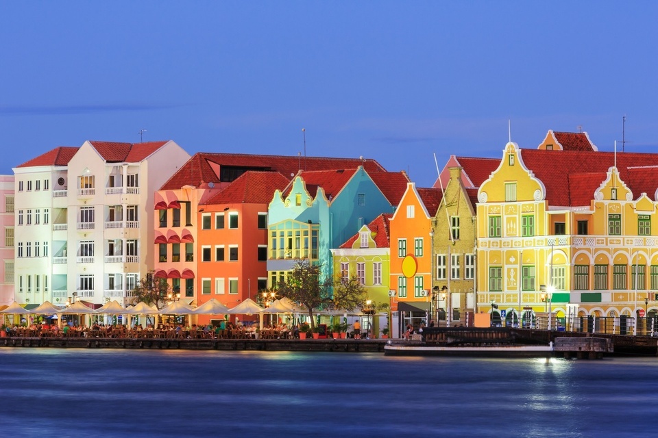 Of the six Dutch Caribbean islands, the most visited may be Aruba and Sint Maarten, but less-frequented Curaçao has more to offer of nearly everything. Except crowds. With a walloping 743 listed monuments in the UNESCO World Heritage Site of Curaçao's capital city, Willemstad, you'll find an astounding array of colorful alleys and waterfronts here, far better preserved and populated than in seemingly "similar" islands. And if you're here for the beaches (it is the Caribbean, after all), you're in luck: The southern coastline is home to 38 jaw-droppers of glittering turquoise hemmed in by romantic cliffs, and most of them are public. And if cocktails by the pool is at the top of your must-list, there's no other island in the Caribbean with a liqueur named after it. From snorkeling and diving to sunset sails and club hopping, Curaçao checks every item on your island bucket list with a fraction of the tourists, and it's often hailed as the most LGBT-friendly island in the entire Caribbean. Here's where to stay and what to do for a seamless tropical escape in Curaçao.⁠
⁠
Tap link in bio to continue on @EDGEmedianetwork⁠
?️‍?✈️☀️?️⛰️❤️⁠
?: Getty
