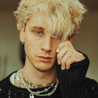 As part of a lengthy interview and photo spread in Spin Magazine, the much-tatted Machine Gun Kelly teased his fans with a pic wearing a translucent shirt and pants with no underwear and a (creatively utilized) sock... Tap link in bio to continue on @EDGEmedianetwork ???❤️⁠
⁠
?: Machine Gun Kelly / Instagram
