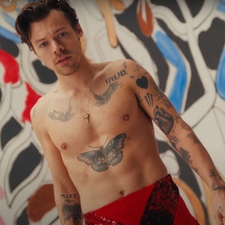With a new album and film on the horizon, Harry Styles is entering a new era. Styles spoke with Capital FM's Roman Kemp for a new interview where the pop star and actor opened up about the sex scenes in his two upcoming films "My Policeman" and "Don't Worry Darling." "I don't know if you can watch either with your parents," Styles, 28, said of the movies, both set to hit theaters this fall. "I'm gonna have to do another one." Kemp followed up by asking if the movies will have any "saucy scenes" that involve Styles, to which he replied, "Yes." Asked if he will be naked, or if he wore a "netball," the musician said he "personally had no experience with a netball. It depends very much on who you're working with and what the situation is." "All I can say, from my experience, is that we were very lucky to have a trusting relationship with the people we were working with and that came first," Styles went on to say. "It was all discussed and all of it was very OK, above the filming, above the camera, it's me and you and we trust each other and at any point we can stop whenever." Based on the Bethan Roberts 2012 novel, "My Policeman" is set in the 50s in Brighton, England and follows a gay policeman named Tom (Styles) as he marries Marion (Emma Corrin), a school teacher, while he is in a relationship with a museum curator named Patrick (David Dawson). "Don't Worry Darling" is a thriller directed by Olivia Wilde, who is currently dating Styles. That film is also set in the 50s. It follows an unhappy housewife played by Florence Pugh as she discovers a dark truth about her husband, played by Styles.⁠
⁠
Tap link in bio to continue on @EDGEmedianetwork⁠
????⁠
?: Harry Styles in his video "As It Was" / YouTube⁠
@harrystyles