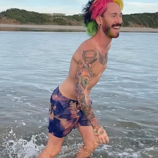 Volunteers came from far and near to help a gay Australian man paint his house in the colors of the rainbow - inside and out - after local homophobes made death threats against him, UK newspaper Daily Mail reports. Hair artist Mykey O'Halloran had moved from Melbourne to a home on Phillip Island during COVID-19. He was making plans to paint his home in rainbow hues when a group of locals, having heard about the idea, decided to weigh in. "On March 16, the group allegedly showed up at his door step, and started verbally assaulting Mr O'Halloran with death threats and homophobic slurs," Daily Mail reports. Others from the neighborhood intervened, and one man (an unidentified 23-year-old), was charged with "unlawful assault" and "making threats," Daily Mail reported. When O'Halloran related the harrowing experience on social media, volunteers came out of the woodwork to help with the work of painting the house. This included professional painters, and an actual paint company, Dulux, which donated paint for the project. "It was amazing," O'Halloran told the media. "Some people just came up to show their support and give me a hug. We had a whole team of kids involved, there was a BBQ." In total, hundreds showed their support, news reports said. O'Halloran, speaking with local news source The Project, estimated that over 60 people had participated in the actual painting. "It was a whole day of community coming together as one." Tap link in bio to continue on @EDGEmedianetwork ???️‍??️? (?️: Kilian Melloy / @dragelruairi , ?: Mykey O'Halloran / Instagram / @mykey_o)
