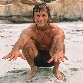 Bryant Wood is best known for his short stint as the sweet, spiritual addition to the second season of Netflix's "The Circle." He didn't make it past the second episode and his early departure led him to be overshadowed in the hunk department by Mitchell Eason, who came on the show on a later episode and appears to have formed a strong bond with another cast member, Chloe Veitch . Bryant, though, wasn't on the show long enough to make strong connections, and it could be because his New Age persona was a bit too etherial for his more cynical peers. When he described himself as working in "breath work," one dismissed him by saying we all breathe, while another wondered if that was just another way of saying he was unemployed. Bryant was introduced on the first episode by host Michelle Bateau as a "bona fide grade-A hippie," reported the website StyleCaster. The shaggy-haired 27-year-old double-downed on his New Age credentials by calling himself as "weirdo" and an "oddball" and told viewers that he lives in a "golden bubble of love" where "no bad juju is allowed." Tap link in bio to continue on @EDGEmedianetwork ??‍♂️??? (Bryant Wood / Instagram / @bryant.give)