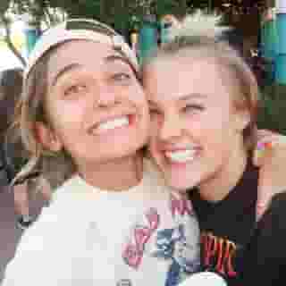 Out entertainer Jojo Siwa and TikTok celebrity Avery Cyrus have ended their romantic relationship after three months, though they still remain friends, UK newspaper the Daily Mail reported. Cyrus, 22, "confirmed the news in a video shared Saturday that featured a clip of Siwa, 19, presenting her with a 'sorry for breaking up with you present,'" the Mail went on to add. Responding to a fan's question, Cyrus explained, "We decided that we are better off as friends! We are both so young and still just trying to figure our stuff out." In another post, Cyrus jokingly referred to being in her "healing era," but suggested that she was easily distracted when "a cute girl walks by." As previously reported at EDGE, Siwa had announced the romance last September, posting that she was the "happiest girl" and sharing video of herself and Cyrus laughing and kissing in a photo booth. That "video came a day after Cyrus, 22, shared a series of photos with Siwa on Instagram captioned: 'Bestest photo dump ever,' " the Mail noted at the time. "She also posted a video to her 7.9 million TikTok followers which showed her traveling all the way from Florida to Los Angeles to give Siwa a snuggle."⁠
⁠
Tap link in bio for more on @EDGEmedianetwork ⁠
??⁠
?: @itsjojosiwa @averycyrus