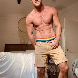 Pride Month got even hotter after Luke Evans posted a shirtless snap on Instagram of him wearing a pair of Pride-inspired Versace underwear. "Wear your pride," the 42-year-old captioned the photo, showing him wearing underwear featuring Pride colors and the brand's logo on its waistband. "Live your pride. Be your pride. And be kind. Everyone deserves to have happiness. Human rights belong to everyone. #happypridemonth and every other month of the year! Thanks @versace for my rainbow pants (yes, that's what we call them in Britain)." "While the post attracted a few trolls who claimed to be 'disappointed' in Evans for speaking out on his sexuality, the overwhelming majority of commenters cheered 'The Girl on the Train' star on for his, to quote one follower, 'thirst trap,' noted Yahoo! Life. "Happy Pride Luke! Everyone does deserve love! Love your rainbow," one fan commented, while another expressed how "proud" they were of him for showing support for his community. This latest photo from Evans continues a recent shift in the actor's presence on social media as he's become more open to sharing his personal life with fans. Tap link in bio to continue on @EDGEmedianetwork ???? (?: Luke Evans / Instagram)