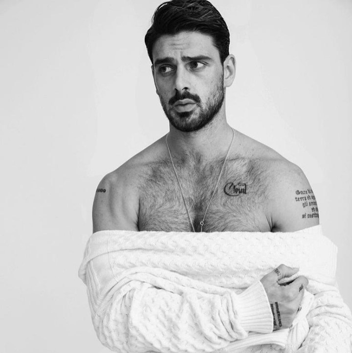 Italian actor Michele Morrone became an overnight sensation last year for his starring role in Netflix's "365 Days." In the Polish erotic drama the 30-year-old plays Massimo Torricelli, a Mafia don who kidnaps a Warsaw woman he had seen on a beach five years before and intends on keeping her prisoner for 365 days until she falls in love with him. Morrone is also a talented musician, having learned to play the guitar at the age of 25 by watching YouTube videos. This week he released "Beautiful," a single with a new video. Regarding the single, Morrone said in a press release: "Whether it's the right time or not, love always feels right and it will hunt you until you submit to it." With "Beautiful," "acoustic chords underline his larger-than-life vocals. With a syncopated bounce, his dynamic delivery culminates on the immediately chantable refrain, 'Wish I could turn it off, let it go, but she's too fucking beautiful,'" reads a press release. Morrone not only starred in "365 Days," he also sang four songs on its soundtrack: "Feel It", "Watch Me Burn", "Dark Room" and "Hard for Me," all of which can be heard on his debut album "Dark Room." Co-written by Morrone, the songs cumulatively tallied north of 200 million streams with the music video for "Hard For Me" amassing over 32 million views and counting. Following the success of his debut album, Morrone became the worldwide face of Guess Men's Fall/Winter 2020 collection. EDGE reported last month that Morrone was overwhelmed with the immediate success of "365 Days." "You have to understand," he told Esquire in an interview, "the night the film premiered on Netflix, I went to sleep and I had 48k followers [on Instagram]. When I woke up I had 2.1 million." His eyes go wide and wild when he recounts the story, every now and then he shakes his head. Tap link in bio to continue on @EDGEmedianetwork ???️‍??? (?: Michele Morrone / Instagram / @iammichelemorroneofficial)