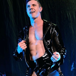 "I got here a year ago," former Scissor Sisters front man @jakeshears tells EDGE from Glasgow, where he's preparing to launch a concert featuring music from his new album, "Last Man Dancing." He's not referring to Scotland per se, but rather to the UK in general, having relocated to London. "I really miss New Orleans a lot," the pop star adds. "I miss my friends in the States. I miss my mom and dad." He goes on to lament the death of his beloved dog, who he'd brought along on the move. But life for Shears has been going full-tilt, and it doesn't sound like he's had much time to brood. "Between the Tammy Faye musical" – for which he wrote the lyrics to Elton John's music – "the album stuff and everything I've been working on, it's been a lot," Shears adds. No kidding: He toured with Duran Duran earlier this year, in addition to finishing the new album and making a handful of videos to go along with it, including the mini-movie set to "Too Much Music," the album's opener, which sees Shears starring in a neo-noir with DL gay overtones. ⁠
⁠
Save this post and tap our link in bio for more on @EDGEmedianetwork.⁠
????⁠
?: @jakeshears