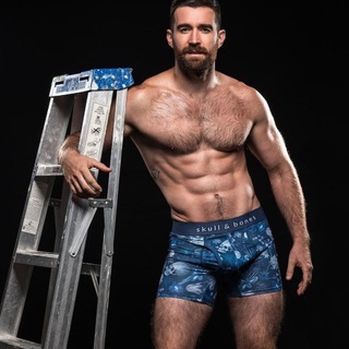 #EDGERewind :: Former gay adult star Woody Fox, who hails from Australia, joined his industry colleagues on an edition of the Australian Broadcast Company's "You Can't Ask That" to talk about the ins-and-outs of the industry. The lean, bearded 33-year-old performer, who retired from the industry in 2019, offered insights and advice from his years working in porn. He joined a number of his colleagues, both male and female, in the segment. Over his career, Fox worked for such companies as Falcon, Hard British Lads, Hot House, Lucas Entertainment, Men.com, Raging Stallion, Naked Sword, and more. He has an OnlyFans account, where he describes himself as "masc, Aussie, acrobat with a cheeky past." Fox discussed his first porn shoot, which was reported by the Star Observer. "I didn't know if I was going to get hard," he joked. "I didn't know if I was going to poop myself." My first shoot was terrifying." Fortunately, he continued. "The first one didn't have a script. Here's some mats, here's some positions." "We had about 10, 20 minutes to get to know each other. As in like 'Hi, how are you? Where are you from? If I bite your ear is that going to be a turn-off?' Just really, really quick. It was more about making sure he was comfortable, sliding in." He also said that despite the content, the main thing about working on a porn set "is that it's not sexual." "There'll be moments where you're starting to connect with a scene partner," he said. "And then there'll be a voice saying, 'Just turn out,' or, 'Hey, we need make-up on the hole.'" Fox discussed an embarrassing moment while filming a rimming scene. "I've pulled these cheeks open and I've been sprayed with douche water," he said. And he admitted that there are definitely size requirements in the industry. "So you'll never really see someone below eight inches in porn," he said.⁠
⁠
Tap link in bio for more on @EDGEmedianetwork ⁠
????⁠
?: @woodyfox_official
