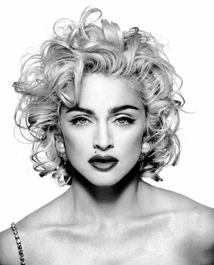 The hottest contest in Hollywood right now might be the one behind the scenes as hopefuls vie to play Madonna in the movie of her life, according to The Hollywood Reporter. The Tinseltown news source notes that interest is high among actors looking to land the role, and would-be leading ladies for the project have come from all quarters — "from Emmy winners and Oscar nominees to singers turned actresses." Among those said to be in top contention is Florence Pugh, who starred in last year's "Black Widow," noted Comic Book. "Since the list of potential Madonnas was released, many people have taken to Twitter to back Pugh as the choice, but the former Academy Award-nominated actor has some competition," the site went on to note, saying that the "finalists also include Julia Garner ('Ozark'), Alexa Demie ('Euphoria'), Odessa Young ('Mothering Sunday'), and Emma Laird ('Mayor of Kingstown')." Those in contention may find themselves in "what can be best described as a Madonna Bootcamp," a "grueling" process that includes "choreography sessions with Madonna's choreographer, after which there are choreography sessions with Madonna, herself," THR said. Work days are long — up to eleven hours long, it's reported. And remember, this is just for the casting of the role. Whoever wins the plum part will "still [be] looking at months' worth of intense training ahead of a potential start date" for filming, THR said.⁠
⁠
Who do you want to play Madge?⁠
⁠
Tap link in bio to continue on @EDGEmedianetwork⁠
?️‍?????❤️⁠
?️: Kilian Melloy / @dragelruairi⁠
?: Madonna / @madonna