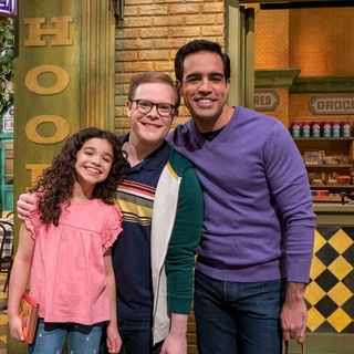 "Sesame Street" has made another big step for LGBTQ representation in its characters by introducing two gay dads and their daughter, reported Yahoo. In an episode titled "Family Day," gay dads Frank (Alex Weisman), Dave (Chris Costa) and daughter Mia (Olivia Perez), help Big Bird realize that families come in all shapes and sizes. The family makes an impact by being represented, explained GLAAD president and CEO Sarah Kate Ellis to Yahoo Entertainment. "The 'Family Day' episode of Sesame Street sends the simple and important message that families come in all forms and that love and acceptance are always the most important ingredients in a family," said Ellis, Yahoo reports. "Frank and Dave, as Mia's dads, are the latest characters in an undeniable trend of inclusion across kids & family programming, one that allows millions of proud LGBTQ parents, and our children, to finally get to see families like ours reflected on TV." Tap link in bio to continue on @EDGEmedianetwork ?️?️‍?? (?️: Emell D. Adolphus / @goodnightdetroit , ?:  Sesame Workshop / Richard Termine)