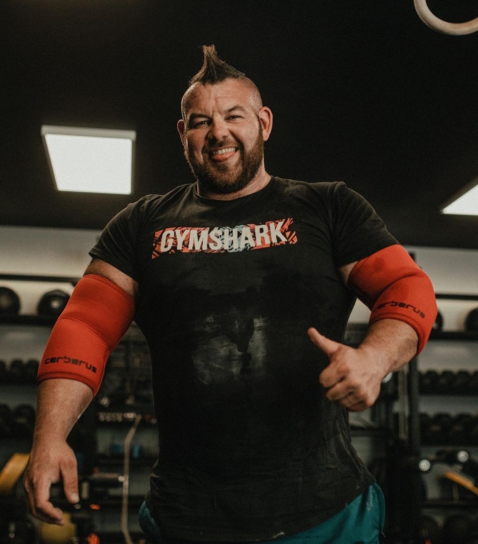 He's billed himself as "The World's Strongest Gay." This week @ worlds_strongest_gay (Rob Kearney) opened up in a TV interview about being out, proud, and married to another man while being active in a hyper-masculine sport. Talking with ABC News program Nightline, Kearney recalled that he always knew he was "different" when he was a not-so-athletic kid, but "I never accepted as to why. It was always just pushed to the back of my mind. And I never wanted to deal with it." Kearney said "it was in the weight room where like I really found myself," but it wasn't he was in college and in a relationship with a young woman that he was finally ready to accept himself and embrace authenticity. "I kind of had this epiphany and I was like, 'I can't do this anymore," Kearney recalled. "Here I am thinking I'm living this heteronormative life and going to have that white picket fence life with a wife and kids, and I'm finally realizing that's not what I want, and that's not what's going to make me happy." From there, the strongman told Nightline, it was a short step to another realization: That "if people didn't like it about me, I didn't need them to accept it. I was finally accepting myself. And that was opening up these doors that I never knew existed." Among those doors that were opening up was the door to the closet. As reported at the EDGE at the time, Kearney came out publicly in 2014. "I think all too often gay men are seen as weak," Kearney told Nightline. "And they're typically portrayed as you know, feminine, flamboyant, and that's really it." But, he added, "Gay doesn't have to look a certain way. Here I am as a gay man with a mohawk and these muscles and competing at the highest level of this hyper-masculine sport of Strongman.⁠
⁠
Tap link in bio to continue on @EDGEmedianetwork⁠
????⁠
?: @worlds_strongest_gay