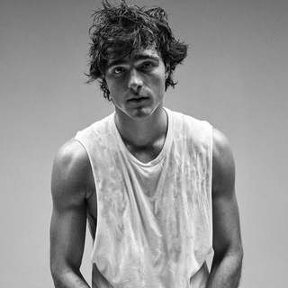 "Euphoria" hunk Jacob Elordi visited "Jimmy Kimmel Live!" this week where he talked about the HBO show's upcoming second season, which included describing the "penis checks" on the set, reports Bustle. They came about because of a number of prosthetic penises used for shower scenes in the series that is currently filming its second season, delayed by the pandemic. "When you come into the makeup trailer, they're all kind of set up," Elordi said, adding that the show's makeup artists have to apply "makeup on the penis" and routinely hold so-called "penis checks" between takes to make sure the "makeup stays on and looks as lifelike as possible." Elordi also told guest host Julie Bowen how he grew a mullet, only to have his girlfriend Kaia Gerber chop it off after just a week. "I had always wanted a mullet and my mum never let me have one cause she wanted me to be a gentleman," he explained. His opportunity came with the pandemic lockdown. "But he admitted that his experience as a mullet man was short-lived. 'My girlfriend [Kaia Gerber], within a week of us dating, she cut it off,' he said. 'She took me to the bathroom and she got scissors out.' "You're cute, but not that cute," he said Gerber told him, which Bowen repeated.Elordi also discussed how the show, which enters its second season after a pandemic delay, will shake things up. "It's insane, but it's like a completely different show," he said. He also said that his character Nate will not be clothed as much in Season 2, which touched upon an issue that bothered Elordi: objectification, either from "Euphoria" or "The Kissing Booth" franchise. Tap link in bio to continue on @EDGEmedianetwork ???? (?: Jacob Elordi / Instagram)