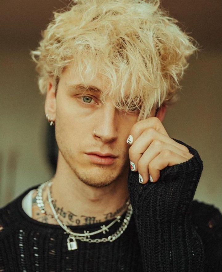 As part of a lengthy interview and photo spread in Spin Magazine, the much-tatted Machine Gun Kelly teased his fans with a pic wearing a translucent shirt and pants with no underwear and a (creatively utilized) sock... Tap link in bio to continue on @EDGEmedianetwork ???❤️⁠
⁠
?: Machine Gun Kelly / Instagram
