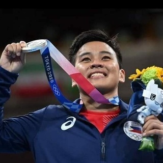 Out boxer Nesthy Petecio of the Philippines is a winner and a proud member of the LGBTQ community. This week, the women's featherweight boxer won a silver Olympic medal and tearfully chose to share the moment with her community, as reported by NBC News. "This win is for the LGBTQ community. Let's go, fight!" she said, according to a translation from ESPN, NBC reports. Petecio is reportedly the first woman from the Philippines to win a boxing medal and the first Filipino boxer to win a medal at the Olympics in nearly 25 years. Petecio's teammate and fellow out boxer Irish Magno became the first Filipino women to compete in boxing at the Olympics, and Magno was the first Filipino woman to qualify for the Games, according to Quartz. "Boxing is one of the most popular sports in the Philippines alongside basketball, The Los Angeles Times reported. Half of the 12 Olympic medals the country has ever won have come in boxing, and it's expected to win two more in boxing before the Tokyo Games end," NBC reports. Petecio says that fellow Filipino boxer Manny Pacquiao has been her greatest inspiration. "I compare my life to his," she said, according to a translation from the Olympic Channel. "We both came from hardships, we both started from nothing. We couldn't eat without debt." She continued, "He really is my idol. Tap link in bio to continue on @EDGEmedianetwork ????️‍? (?️: Emell D. Adolphus / @goodnightdetroit / ?: Nesthy Petecio / Instagram / @neshpetecio / AP)