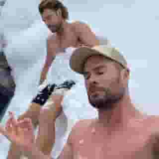 #2022Rewind :: Chris Hemsworth showed some of his super-hero skills in a new Instagram post where he and a friend take a snow bath in sub-zero Austrian temperatures, the Daily Mail reports. With an expression that shows the star channeling his best Zen, he captioned his pic with a prediction that he is part of an upcoming health meme: "Ice baths are old news. It's all about snow baths in 2022." "Some alternative medicine advocates claim submerging one's body in cold water, snow or ice can have health benefits," adds the Daily Mail.  But in the comment section, one user suggested an unwelcome side effect of a snow bath: "Captain shrivel after that brother hahaha." Another user saw the pic as a reference to the 2020 Netflix film "Extraction," which stars Hemsworth. He also shared a video of his workout regimen for the film. "Gearing up for @netflix Extraction sequel. Transitioning from heavy weight training to a lot more body weight functional movements concentrating on agility, strength and speed. Give this little work out a go and let the lungs scream for mercy!" he writes in his comment to the what appears to be an exhausting routine.⁠
⁠
Tap link in bio for more on @EDGEmedianetwork ⁠
????⁠
?: Chris Hemsworth