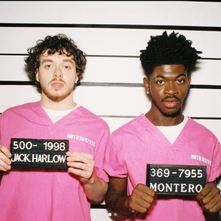 When Jack Harlow didn't turn up in the shower scene in Lil Nas X's "Industry Baby" video that dropped on Friday, One fan tweeted, "kinda was wishin to see jack n ya gettin nasty together but it was fine liked it super gay as always u're doin great sweetie." A clothed Harlow appears in the video dancing with a female dancer and helping Lil Nas X break out of Montero State Prison, but his non-appearance in the shower scene wasn't his choice. "He surprised many when he responded to online comments by saying he'd gladly have doffed his boxers and popped into the shower with Nas and the boys," reports Variety. "Nas wrote the whole treatment for this video and I followed his lead every step of the way. If he had asked me to be in that shower scene I woulda been in that shower scene," he wrote. "I just let the mastermind cook. Honored to be a part of it." Lil Nas X responded, "wait!!! i didn't know! let's shoot it again! please jack harlow!!! please." He then apologized to the LGBTQ community: "Then he added, "to the lgbtq+ community i sincerely apologize. i have failed you. i am embarrassed. i am ashamed. and i will learn from my mistakes." When a fan suggested they make a video immediately, Lil Nas X wrote, "i already tried he's not here for it." Then adding in the comment, "ohhh he meant music." Tap link in bio to continue on @EDGEmedianetwork ??️‍?? (?: Jack Harlow & Lil Nas X / Instagram / @jackharlow)