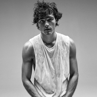 Aussie actor Jacob Elordi returned to model for Calvin Klein this week and opened up in an interview about his "Euphoria" character Nate. Jacob Elordi first turned heads in the Netflix teen comedy "The Kissing Booth," in which the 24-year old Australian displayed his "Abercrombie & Fitch-worthy bod in five fabulously fap-worthy shirtless scenes," wrote the adult site The Sword. Fashion influencers took notice and the following year he joined a slew of celebrities to take part in Calvin Klein Underwear's 2019 fall campaign called #MYCALVINS IRL that posed the question, "How do you do sexy? Perfectly filtered or IRL [in real life] raw?" This week the 6'4" co-star of HBO's provocative teen drama "Euphoria" was seen in "a new Calvin Klein ad that displays pieces from the 2021 Spring collection," reports the website Revolt. For the campaign photographer Mario Sorrenti (whose association with the brand dates back to the iconic 1993 campaign with Kate Moss) features Elordi along with "Hamilton's" Anthony Ramos, activist Janaya Future Khana modeling items from the line, which includes white tees, classic denim silhouettes and a variety of monochromatic and gender-neutral pieces. Reggae artist Koffee, Queer Skate LA, Japenese pop star Rina Sawayama, skateboarder Sage Elsesser and dancer Vinson Fraley are also featured in the ad. Elordi, W notes in an interview, has been delving into the fashion world over the past few years, notably standing out at Burberry fall 2020 in a sequined mesh undershirt and "the first—and so far only—prominent male-identifying celebrity to embrace Fendi's revamped menswear version of its iconic Baguette bag." He says the reason why he did the first CK campaign was "because I thought my mum would find it cool." And adds that working with Sorrenti was an honor. "His work is brilliant. I'm always grateful sharing a space with an artist like that, it gets me going creatively." Tap link in bio to continue on @EDGEmedianetwork ?? (?: Jacob Elordi / Instagram / @jacobelordi / @calvinklein / @mario_sorrenti / #mycalvins)