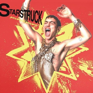 2021 has been a big year for out singer/actor Olly Alexander. The Years and Years lead singer showed his acting chops in a big way as one of the leads in "It's a Sin," Russell T. Davies' moving series that looked at the AIDS epidemic in Britain in the 1980s. In a critic's pick review in the New York Times, television critic James Poniewozik wrote: "Among a roundly excellent cast, Alexander is especially good at showing the boyish light that Ritchie keeps alive in himself even as he grows increasingly afraid it will be snuffed out early." The show was a big hit on both sides of the Atlantic, even leading to an increase in HIV testing in England. Learning of this, Alexander said on the BBC Breakfast morning show: "I'm trying not to cry. I think it's just amazing to see a real-time response to the show from the audience who is watching. I'm just really moved by it honestly." Today, Alexander posted new music to YouTube, the first single from his new album, called "Starstruck," the French website TÊTU reports. "Pop and efficient, this new track with funk accents is reminiscent of Justin Timberlake's Can't Stop The Feeling . If I could bottle you, I'd sip you all night,' the openly gay singer admits." Tap link in bio to continue on @EDGEmedianetwork ?? (?: Olly Alexander / Instagram)