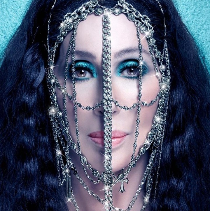 In Variety this week, writer Marc Malkin recalled the ingenious way he got to Cher. Speaking of the encounter in a new interview with the legendary musician, Malkin recalled how, a few years go, they crossed paths on the red carpet at a Mike Nichols event. He and other reporters shouted questions, but she ignored them and walked on. "Feeling courageous — or maybe more desperate — I yelled out as loud as I could, 'Cher!' She turned around. When our eyes met, I screamed, 'I'm gay.' "Cher smiled and came over to me. I got my interview." In sharing his recollection with the superstar on the "Just for Variety" podcast, Cher jokingly responded, "You said the magic word. And it worked. ... It shows my commitment." That, Malkin recalled, went, way, way back to when 10-year old Cherilyn Sarkisian realized that gay men were more fun than those who were straight. It was when her mom introduced her to a group of hairdressers during a Palm Springs weekend. "I thought, 'Why are these men so much more fun than the men I know?' because I only knew straight men from my father and his friends. They were always great but wouldn't joke around as much," she remembered. "That's when it first happened to me, when I was 10. It was kind of a love affair from then on." Tap link in bio to continue on @EDGEmedianetwork ?️‍??? (?: Cher / Instagram)
