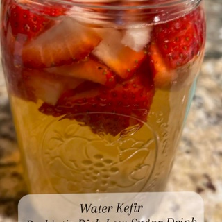 ? Water Kefir: A Versatile Gut-Healing Staple! ?

Water kefir is one of the easiest, most versatile, and budget-friendly ways to support a healthy gut for the entire family! This probiotic-rich drink is not only delicious but also customizable to your favorite flavors. 

What is Water Kefir?
Water kefir is a naturally fermented drink made by using water kefir grains, a colony of beneficial bacteria and yeast. It’s packed with probiotics that support digestion, boost immunity, and help maintain a balanced gut microbiome.

Health Benefits ??
? Probiotic Power: Helps populate the gut with healthy bacteria to support digestion, reduce bloating, and improve nutrient absorption. ? Immune Support: A healthy gut microbiome strengthens the immune system. ? Naturally Detoxifying: The probiotics in water kefir support the liver and help eliminate toxins from the body. ? Gentle on the Stomach: A great alternative to dairy-based probiotics, making it perfect for anyone with lactose sensitivities.

Flavor Varieties ???
One of the best parts about water kefir is how customizable it is! After fermenting, you can add fruits, herbs, and spices for a second fermentation to create refreshing flavors: ? Lemon & Ginger: A zesty immune-boosting option. ? Strawberry & Mint: A sweet, refreshing treat. ? Mango & Turmeric: Packed with antioxidants and anti-inflammatory benefits. ? Pineapple & Basil: A tropical twist with a subtle herbal note. ? Apple Cinnamon: Perfect for a cozy, fall-inspired flavor.

Cost-Efficiency ?
Store-bought probiotics can cost a fortune, but making water kefir at home is a fraction of the price. With reusable grains, you can enjoy endless batches of this gut-healing elixir for pennies per serving!

Why It’s a Staple
Water kefir is a simple, delicious way to incorporate probiotics into your daily routine. It’s family-friendly, easy to make, and a great alternative to sugary drinks!

✨ Want to start your own water kefir journey? Comment “KEFIR” below, and I’ll send you the link to where I got my grains and share some more fun water kefir recipes! ?