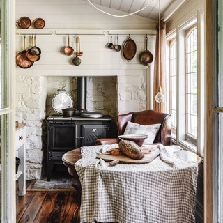 This heritage home in Victoria's tiny town of Dry Diggings has been gently restored, ensuring it will remain a time capsule for years to come.⁠
⁠
Because of the home's small size, every item brought in had to be carefully considered. Here in the dining room, copper pots from owner Ben's beloved late mother Raewyn, and a table that once belonged to his great-grandmother, add meaning.⁠
⁠
Step inside via the link in bio.⁠
⁠
Photography: @marniehawson⁠
Styling: @bellebrightproject⁠
Words: @penny.carroll⁠
⁠
#copperpots #countrystylehome #countrydiningroom #countrystyle #diningroom 