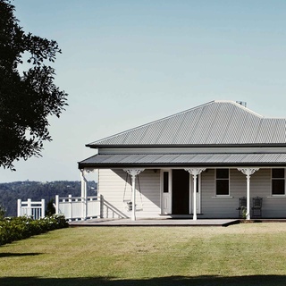 It's not unusual for guests at Montville Lake Terrace to wish the immaculate Queenslander was home for more than just a few⁠
days.⁠
⁠
With sweeping views of the Sunshine Coast hinterland and plenty of places to soak them in, this luxurious guest house is an heavenly place to stay.⁠ "It's this idyllic Queenslander with a white picket fence, dark wooden floors and a beautiful kitchen." says owner Heidi. "The reason it all works is because this is what [we] have always dreamed about, too."⁠
⁠
Step inside via the link in bio. ⁠
⁠
Photography: @sharyncairns⁠
Words: @cathmccormack⁠
⁠
#queenslander #accommodation #montvillensw #whiteweatherboard #countryverandah #timberdeck