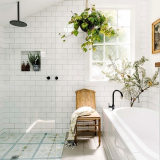 A far cry from their sleek and shiny counterparts, country bathrooms feature hard-worn materials like recycled timber, aged brass, natural stone and durable marble paired with the ever-present subway tile and the occasional claw-foot bath.⁠
⁠
If you're planning a country style bathroom overhaul, take inspiration from our round-up of 23 bathrooms sporting a rustic edge.⁠
⁠
Tap the link in bio to read more.⁠
⁠
Photography: @marniehawson⁠
Words: @tahnimesann⁠
⁠
#subwaytiles #countrybathroom #countrystylebathroom #bathroomdesign #indoorhangingplants