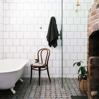 The claw-foot bath next to an open fireplace at @thefarmerscottage is the height of luxury. But just a few years ago, this cottage had almost completely succumbed to the forces of nature. Current owner Abby McKibben says when she first inspected the place, “Grass was growing up through the floorboards and there were four possums living in the roof.” While anyone else might be tempted to let nature take its course, Abby and her husband Josh were taken by the views and, of course, that convict-built brick fireplace in the bathroom. See what the cottage looks like today by clicking the link in bio. ⁠
⁠
#bathroom #bathroomdesign ⁠
#interiordesign #renovation #cottagelife⁠
⁠
Words: @becwhish⁠
Photography: @marniehawson
