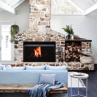 As the days get shorter and noticeably cooler, few things in life are more comforting than sitting before a hearth, and warming up in front of a crackling open #fire.⁠
⁠
Tap the link in our bio for 17 cosy #fireplaces that bring warmth and style to their respective homes. ⁠
⁠
Photography: @markroperphotography⁠
⁠
#fireplacedesign #livingroom #farmhouse ⁠
