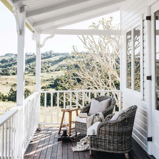 The gorgeous verandah of Glenfernie Farm comes complete with stunning views of Newrybar's rambling landscape.⁠
⁠
Home to Millie Cooper, her partner Isobel Walsh, and their miniature schnauzer, Theodore, this white weatherboard has all the charm you'd expect from a country home of its location.⁠
⁠
Step inside via the link in bio.⁠
⁠
Photography: @abbie_melle⁠
Words: @justicelyn⁠
Location: @glenferniefarm⁠
⁠
#whiteweatherboard #byronhinterlands #countrystyleverandah #verandah