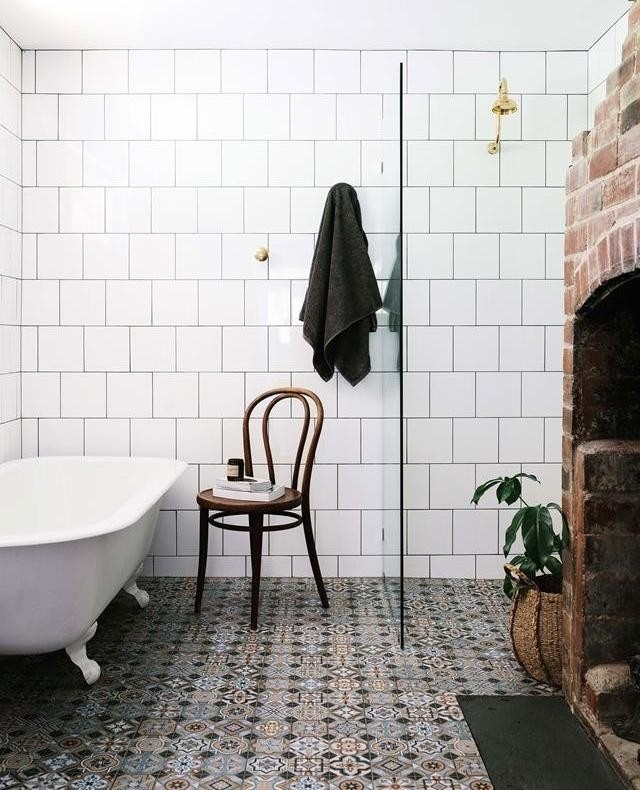 The claw-foot bath next to an open fireplace at @thefarmerscottage is the height of luxury. But just a few years ago, this cottage had almost completely succumbed to the forces of nature. Current owner Abby McKibben says when she first inspected the place, “Grass was growing up through the floorboards and there were four possums living in the roof.” While anyone else might be tempted to let nature take its course, Abby and her husband Josh were taken by the views and, of course, that convict-built brick fireplace in the bathroom. See what the cottage looks like today by clicking the link in bio. ⁠
⁠
#bathroom #bathroomdesign ⁠
#interiordesign #renovation #cottagelife⁠
⁠
Words: @becwhish⁠
Photography: @marniehawson