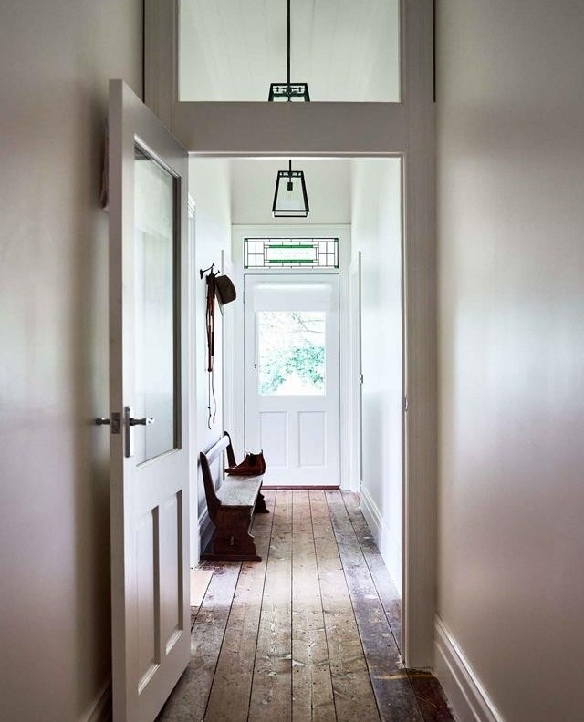 Welcome to a sixth generation family #farmhouse #cottage in Nowhere Creek, VIC. Jack and Kirby Kaye had been dating for about two weeks when Jack said, “I need you to come home and see the farm and if you can’t live there then there’s no relationship.”  ⁠
⁠
Luckily when Kirby finally saw the farm, she fell in love. “It was beautiful straight away,” she says. ⁠
⁠
Today, Jack and Kirby call the farm home and have undertaken a slow and steady #renovation of their historic cottage. Here, in the #entrancehallway, the original #floorboards have been retained. Tour the home by clicking the link in our bio. ⁠
⁠
Photography: @markroperphotography⁠
Styling: @hannah.brady⁠
⁠
⁠
