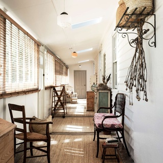 After years dreaming of a move to the country, one Sydney couple finally took the plunge, purchasing a grand 18-room house with good bones, a charming garden and a vibrant history. ⁠
⁠
After some minor repairs and a fresh coat of paint, they soon filled the home with a collection of treasured antiques. "None of our pieces are worth a lot but they hold memories of our travels and the talent of friends and family," says owner Meg. ⁠
⁠
Tap the link in our profile to step inside. ⁠
⁠
Photography: @mtwee1⁠
Words: @penny.carroll⁠
⁠
#hallway #antiquefurniture #juterug #historichome #farmhouserenovation 