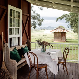 "We love the house's charm and its quirks," says Katie Robke, who lives on a ginger farm on the Sunshine Coast.⁠
⁠
With a long-term lease in place, the owners gave Katie their blessing to treat the 1880s cottage as her own. A lick of barn-red paint and a collection of vintage furniture, has made the old farmhouse feel like a home.⁠
⁠
Tap the link in our bio to step inside.⁠
⁠
Photography: @kararosenlund⁠
Words: Sarah Pickette⁠
⁠
#verandah #outdoordining #vintagestyle #farmhouserenovation #farmhouse #countryliving