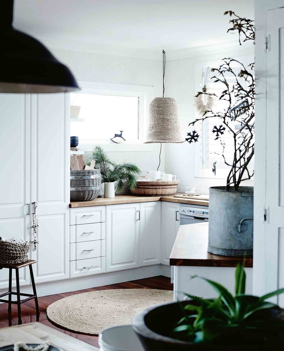 Before Michelle Woods of Mich and Mace moved into this two-storey home overlooking Port Phillip Bay on Victoria's Mornington Peninsula, it was dated and painted in a kaleidoscope of colour. ⁠
⁠
"We felt like we were living in Rubik's Cube," she says. The home is now light and bright, and the perfect setting for Christmas celebrations with extended family. ⁠
⁠
Michelle often makes her own wreaths from cut vines or bunches of foliage tied together.⁠
⁠
Tap the link in our profile to tour the home and be inspired to create your own simple, yet beautiful Christmas decorations.⁠
⁠
Photography: @markroperphotography⁠
Styling: @tess.newman.morris⁠
Words: @virginia_imhoff⁠
⁠
#coastalchristmas #coastaldecor #coastalstyle #whitekitchen #timberkitchen #christmasdecorating