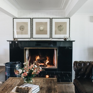 Thoughtfully designed to carry guests from the region's steamy summers into its chilly winter months, Bundara Farm at Berry is practically purpose-built for gathering.⁠
⁠
From cosy fireplaces to long tables shrouded with climbing grapevine, each space within this divine accommodation invites relaxation and retreat.⁠
⁠
Step inside via the link in bio.⁠
⁠
Photography: @abbie_melle⁠
Words: @lucycf94⁠
Location: @bundarafarm⁠
⁠
#fireplace #leathersofa #chandelier #countrylivingroom #berrynsw