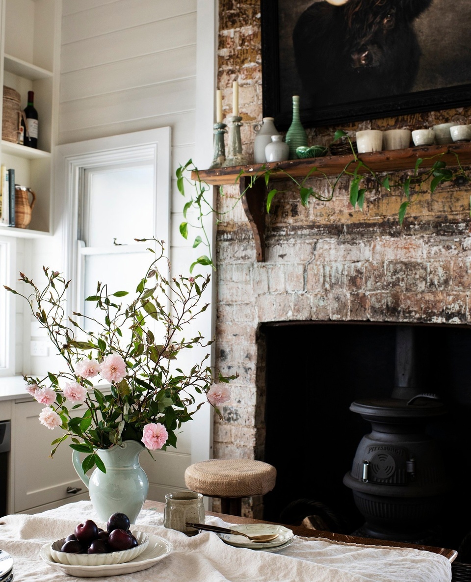 As the owners of boutique agency @wheresbrentbeen, Brent Wallace and Dan Ingram are practically professional globetrotters. However, it's this 1910 Federation cottage in the charming town of Picton where their hearts really lie.⁠
⁠
Taken with the property's bullnose verandah, iron lace trim, pot-belly stove and timber-lined rooms, the couple could hardly deny themselves its purchase. "We do feel connected here," Brent says. "We're lucky, because we get to travel. But we'll  always be country now."⁠
⁠
Step inside via the link in bio.⁠
⁠
Photography: @brigidarnottphotography⁠
Words: @penny.carroll⁠
⁠
#potbellystove #countrykitchen #countryhome #Federationcottage #pictonnsw