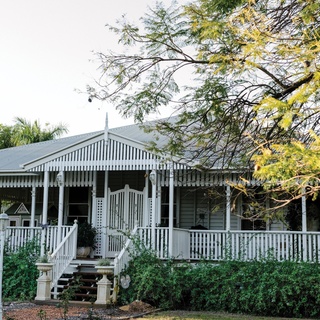 Since moving in, the owner of this 130-year-old former bank building Leah Stirton has splashed her personality throughout every space ("You've got no idea how much I hate all-white," she says).⁠
⁠
Although Leah's affinity for theatre and drama shines through in this home's vibrant style, the property is ultimately built for family living. "I love that my kids can ride bikes and scooters through the halls and around the verandahs and back again," she says. "It horrifies most mothers, but I've come to learn I'm not like most mothers when it comes to 'keeping house'. I like it that way."⁠
⁠
Step inside via the link in bio.⁠
⁠
Photography: @hannahpuechmarin⁠
Styling: Cheryl Carr⁠
Words: @jessicabellef⁠
⁠
#homeconversion #homeexterior #whiteweatherboardhome #queenslander #weatherboardhome