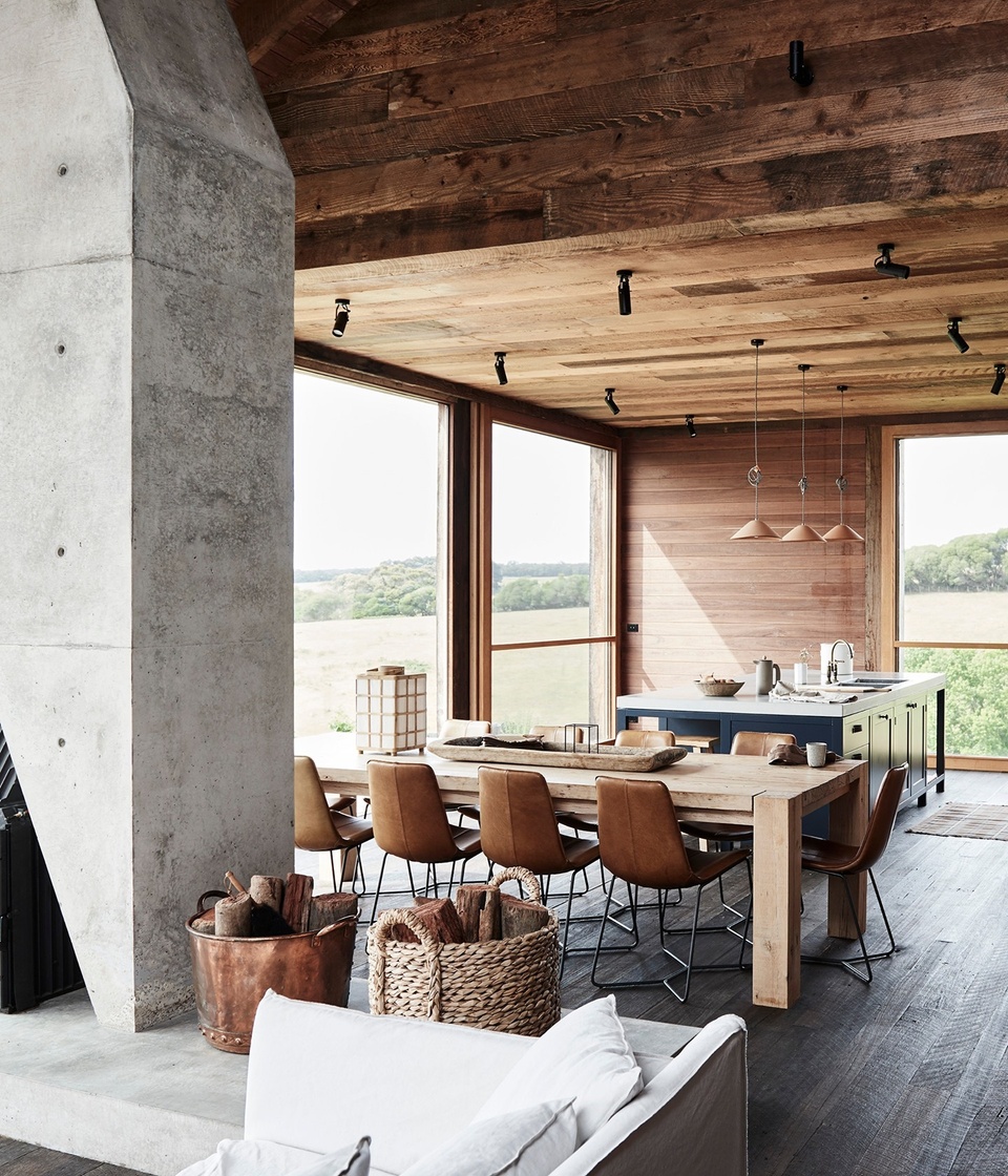 In this cabin-like home, rooms are enveloped in natural textures and tones of aged timber, contrasting with the angular sculptural concrete chimney that functions as both flue for the wood-burning heater and a room divider. "It's an art piece in itself," says owner Fran, who wanted to showcase the home's timber tones. ⁠
⁠
Tap the link in our bio to see more of @thewensley, a unique country escape on Victoria’s Surf Coast. ⁠
⁠
Photography: @lisacohenphoto / Styling: @tess.newman.morris⁠
⁠
#timberhome #GreatOceanRoad #diningroom #Australianhomes⁠
⁠
