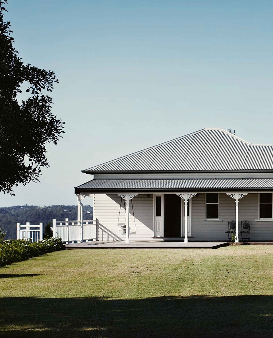 It's not unusual for guests at Montville Lake Terrace to wish the immaculate Queenslander was home for more than just a few⁠
days.⁠
⁠
With sweeping views of the Sunshine Coast hinterland and plenty of places to soak them in, this luxurious guest house is an heavenly place to stay.⁠ "It's this idyllic Queenslander with a white picket fence, dark wooden floors and a beautiful kitchen." says owner Heidi. "The reason it all works is because this is what [we] have always dreamed about, too."⁠
⁠
Step inside via the link in bio. ⁠
⁠
Photography: @sharyncairns⁠
Words: @cathmccormack⁠
⁠
#queenslander #accommodation #montvillensw #whiteweatherboard #countryverandah #timberdeck