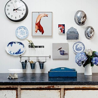 Sometimes a group of simple things can make a grand display. At the home of winemakers Peter and Hannah Logan of @logan_wines, vintage china, silver cloches and artworks hang above a rustic sideboard. Hannah worked closely with interior stylist @megan_morton to ensure that her "million ideas" wouldn’t overwhelm the space. To see the rest of the home, which is brimming with pops of vibrant colour, click the link in bio. ⁠
⁠
#interiordecor ⁠
#countryliving ⁠
#renovation ⁠
#decoration⁠
⁠
Words: Catherine McCormack⁠
Photography: @felix_forest