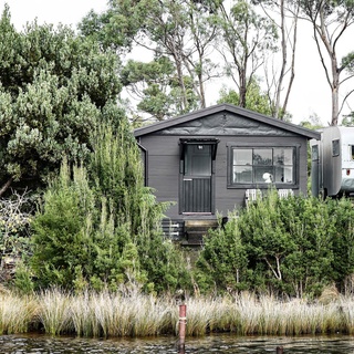 Though the two weren't in search of a property when visiting Tasmania's west coast four years ago, Claire and Matthew's visit to bayside Bushy Summers sparked a new adventure.⁠
⁠
"We pulled it apart and stripped it down to its bones," says Claire of the renovation, which included new flooring, wiring and plumbing. "We lived in a caravan on site... It was both challenging and charming."⁠
⁠
Step inside via the link in bio.⁠
⁠
Photography: @nicgossage⁠
Styling: @clairelloydsensualliving⁠
Words: @alicemoffitt⁠
⁠
#baysidehome #tasmania #lettesbaytas #blackcottage