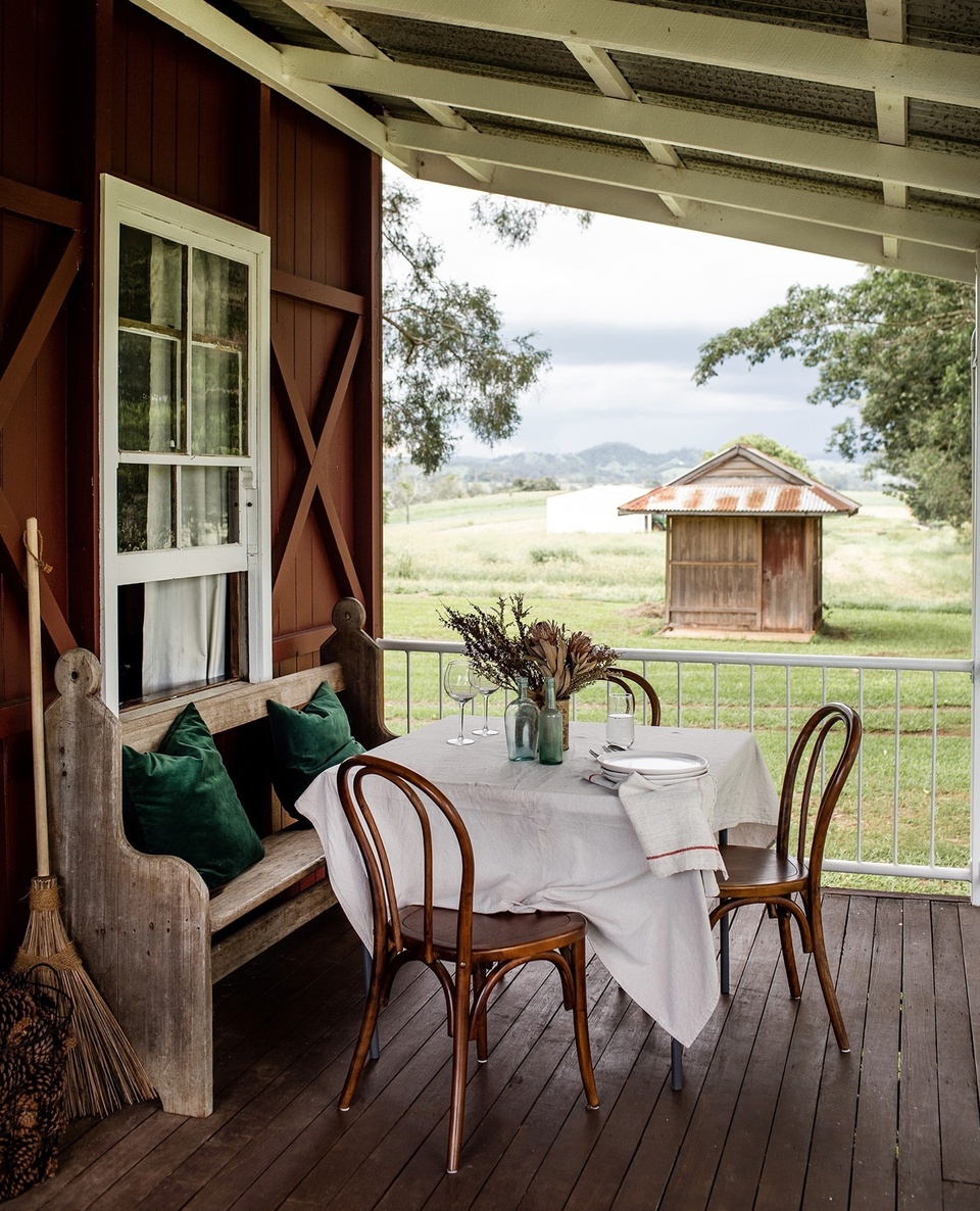 "We love the house's charm and its quirks," says Katie Robke, who lives on a ginger farm on the Sunshine Coast.⁠
⁠
With a long-term lease in place, the owners gave Katie their blessing to treat the 1880s cottage as her own. A lick of barn-red paint and a collection of vintage furniture, has made the old farmhouse feel like a home.⁠
⁠
Tap the link in our bio to step inside.⁠
⁠
Photography: @kararosenlund⁠
Words: Sarah Pickette⁠
⁠
#verandah #outdoordining #vintagestyle #farmhouserenovation #farmhouse #countryliving