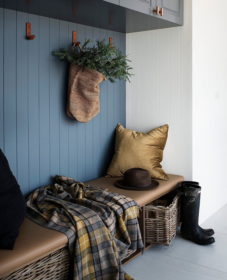On a former sheep property in the NSW Southern Tablelands, a family have created a rammed earth farmhouse and converted a set of old stables into a welcoming guest house. ⁠
⁠
Here, the entrance of the guest house has been decorated with fresh foliage, woven storage baskets and a cosy woollen throw.⁠
⁠
Tap the link in our profile to take a tour of the property.⁠
⁠
Photography: @brigidarnottphotography⁠
Styling: Jodie Gibbons @belljarinteriors⁠
Words: Bronwyn Phillips⁠
⁠
#homeentry #christmasdecorating #hallwaystorage #entrancestyling #homeconversion