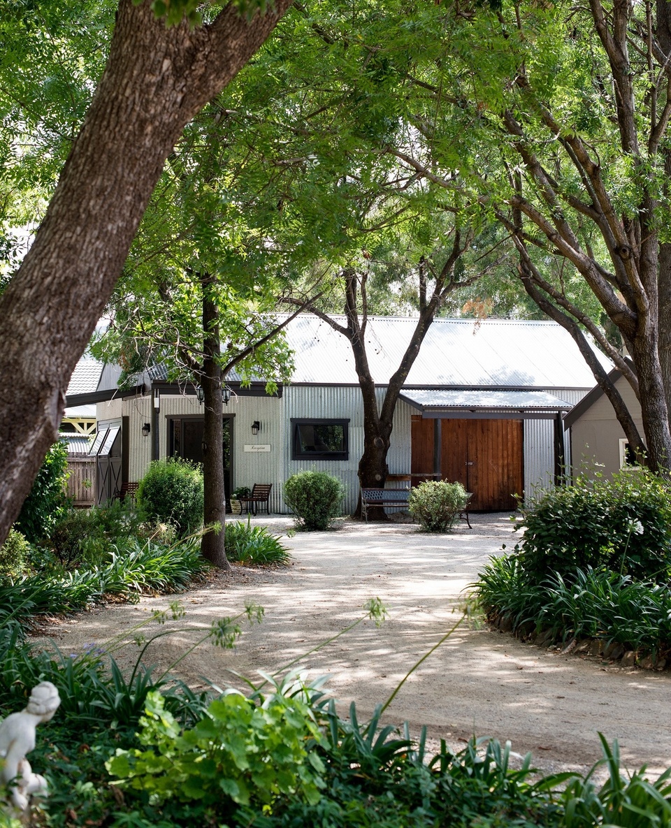 Visitors to Mudgee in NSW's central west can rest and recharge at this leafy sanctuary where four-legged friends are welcome.⁠
⁠
"Dogs are part of the family," says owner Stacey Stoddart, who purchased Evanslea along with her husband Phil, in 2017. ⁠
⁠
"I love making people feel special and Phil loves plants so the property ... offered us both an amazing business opportunity in which we could further develop our passions while working together." ⁠
⁠
Tap the link in our bio to take a tour of the historic property. ⁠
⁠
Photography: @brigidarnottphotography⁠
Words: @clairemactaggart⁠
⁠
#shedhouse #homeconversion #renovation #evergreengarden #frontgarden #countryhome