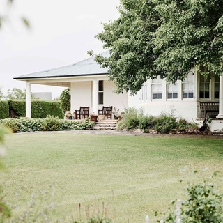 Built in 1915 and gifted to owner Mike's grandmother on her wedding day, this Southern Tablelands farmhouse is surrounded by 100-year-old looming hedges, climbing ivy, majestic pin oaks and English elms.⁠
⁠
Though originally envisioning a life in the city as a young woman, Mike's wife Katie now seems completely in her element living here. "It took me a little while to adjust, but now I would never live back in the city. Country people are just more relaxed and they have time for each other."⁠
⁠
Step inside and onto the grounds via the link in bio.⁠
⁠
Photography: @lisacohenphoto⁠
Styling: @becksimonstylist⁠
Words: @tmplatt1platt1⁠
⁠
#farmhouse #countryhome #southerntablelands #yassnsw #whitehomeexterior