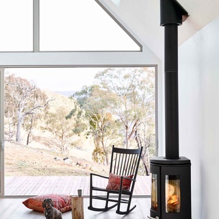 After falling in love with the Lithgow region on their wedding anniversary, one couple decided it was the perfect place to build a dream cabin. ⁠
⁠
Tap the link in our profile to follow Millie the wire-haired dachshund on a tour of the home which features floor-to-ceiling windows, a glorious hallway with five sets of sliding barn doors and a sophisticated neutral colour palette. ⁠
⁠
Photography: @markroperphotography⁠
Styling: @nicolasevitt⁠
⁠
#barnhouse #danishstyle #fireplace #rockingchair #dachshundgram #skylights