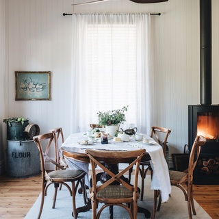 Filled with delightful curiosities, collections of oil paintings, and worn leather armchairs, Goulburn Valley accommodation The Storekeeper's House expertly toes the line between homey and simplistic.⁠
⁠
Although she now shares it with guests, owner Carrie Donaldson was far from removed from the process of this personality-filled cottage's creation. "We bought the house in May 2018 and spent close to three years renovating it," Carrie recalls. "We lived there during lockdowns, and it was comforting being part of a small community during those strange times."⁠
⁠
Take a tour via the link in bio.⁠
⁠
Photography: @abbie_melle⁠
Styling: @leesa_oreilly⁠
Words: @hannahjameswords⁠
Location: @_thestorekeepershouse⁠
⁠
#vintgeartwork #antiquefurniture #retrofurniture #fireplace #countrydiningroom 