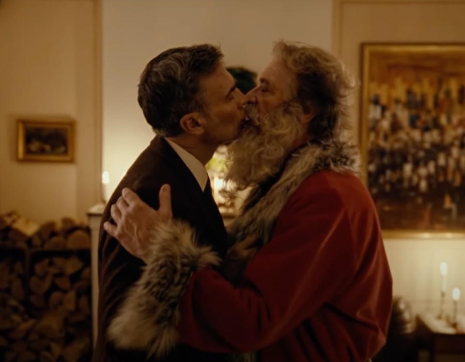 It appears that a Norwegian ad featuring a daddy kissing Santa Claus has upset some, claiming that it sexualizes Christmas.⁠
⁠
The four-minute video, released by Posten, the country's postal service, features a frustrated Santa Claus who is unable to spend time with an attractive younger daddy he meets by chance one year because of his holiday duties. The pair can only pass affectionate glances when they meet each year until the daddy sends Santa a letter saying, "all I want for Christmas is you," which leads to Santa taking some drastic action.⁠
⁠
The heartfelt video, entitled "When Harry Met Santa," could easily be expanded to feature-length, putting a 21st-century spin on the 1950s classic "I Saw Mommy Kissing Santa Claus." It also concluded with a historical title note: "In 2022, Norway marks 50 years of being able to love whoever we want. Merry Christmas and a Happy New Year from all of us to all of us."⁠
⁠
Tap link in bio to continue on @EDGEmedianetwork ?️‍?????⁠
⁠
?: YouTube