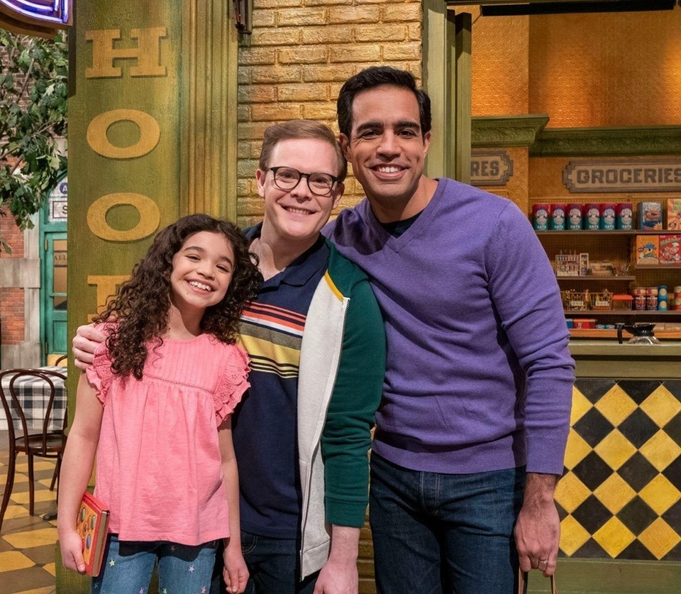 "Sesame Street" has made another big step for LGBTQ representation in its characters by introducing two gay dads and their daughter, reported Yahoo. In an episode titled "Family Day," gay dads Frank (Alex Weisman), Dave (Chris Costa) and daughter Mia (Olivia Perez), help Big Bird realize that families come in all shapes and sizes. The family makes an impact by being represented, explained GLAAD president and CEO Sarah Kate Ellis to Yahoo Entertainment. "The 'Family Day' episode of Sesame Street sends the simple and important message that families come in all forms and that love and acceptance are always the most important ingredients in a family," said Ellis, Yahoo reports. "Frank and Dave, as Mia's dads, are the latest characters in an undeniable trend of inclusion across kids & family programming, one that allows millions of proud LGBTQ parents, and our children, to finally get to see families like ours reflected on TV." Tap link in bio to continue on @EDGEmedianetwork ?️?️‍?? (?️: Emell D. Adolphus / @goodnightdetroit , ?:  Sesame Workshop / Richard Termine)